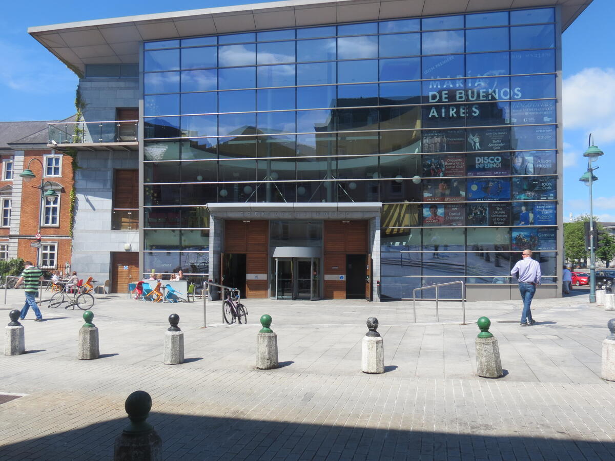 The glass-fronted Cork Opera House in Cork city centre on a sunny day.